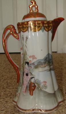 front of cocoa pot