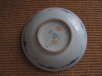 Reverse of plate showing marks and attached labels
