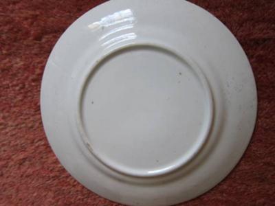 Back of smaller plate.  None have markings