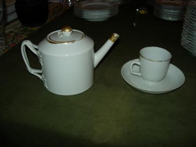 Teapot and saucer