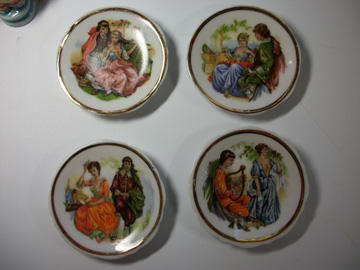 front of all four plates